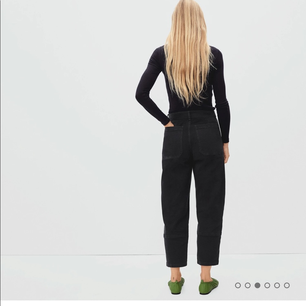 The Utility Barrel Pant, in black and light blue, never worn